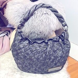 Authentic Louis Vuitton/
Limited Edition Olympe Nimbus"